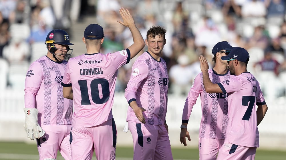 Middlesex's Luke Hollman (C) celebrates a wicket against Kent in the Vitality Blast