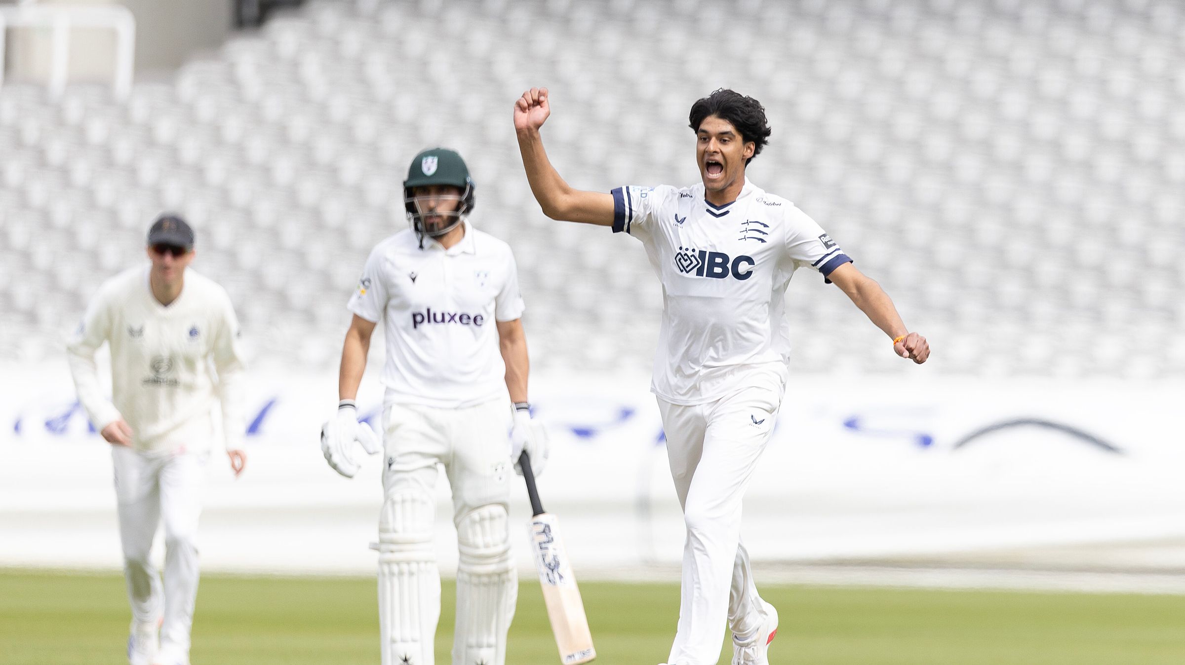 Sharma clenches fist after snaring Gareth Roderick for a duck