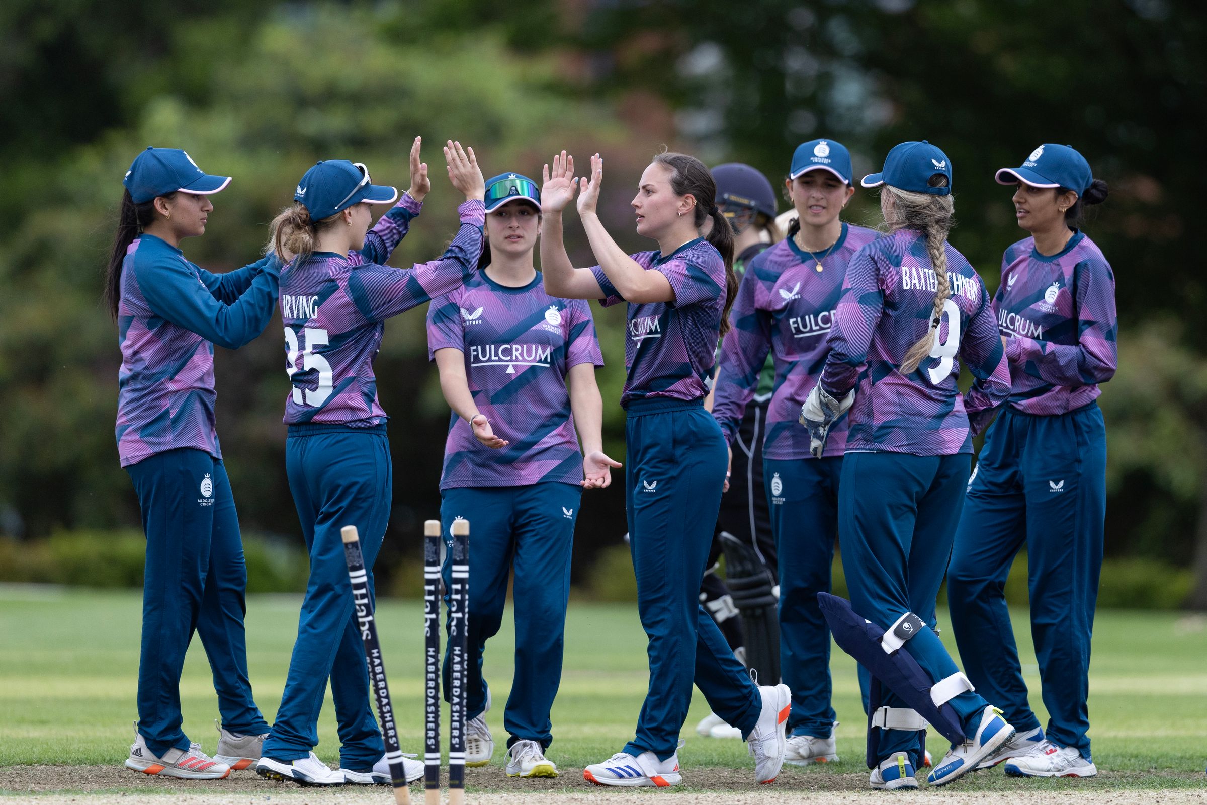 Middlesex Women celebrate a wicket against Berkshire